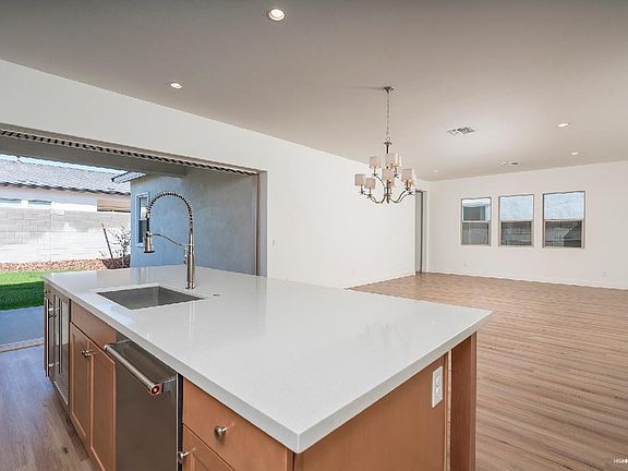 Kitchen With Views of Great Room, Dining Space and Covered Patio