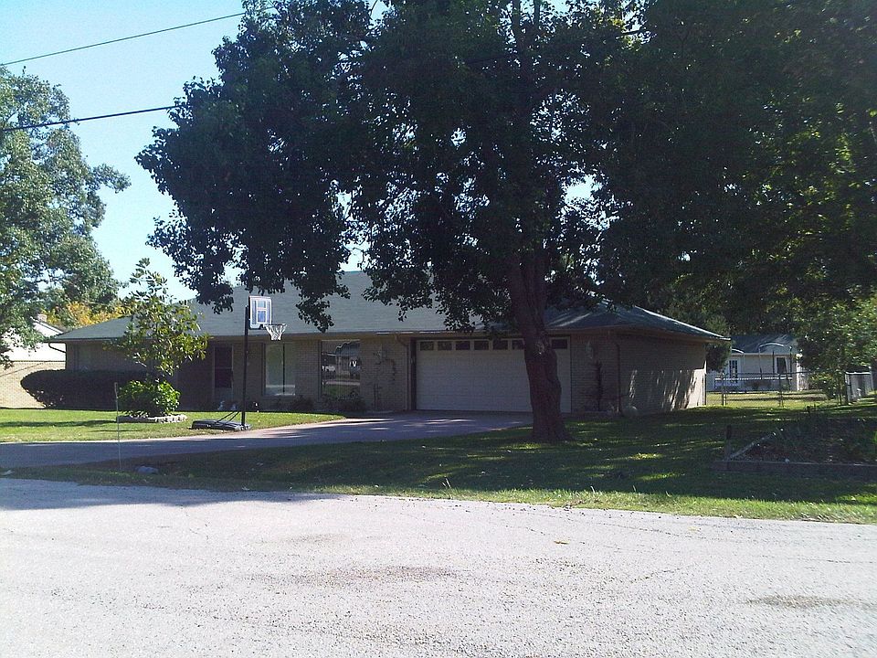 Mature trees on a half acre makes this a serene place to live