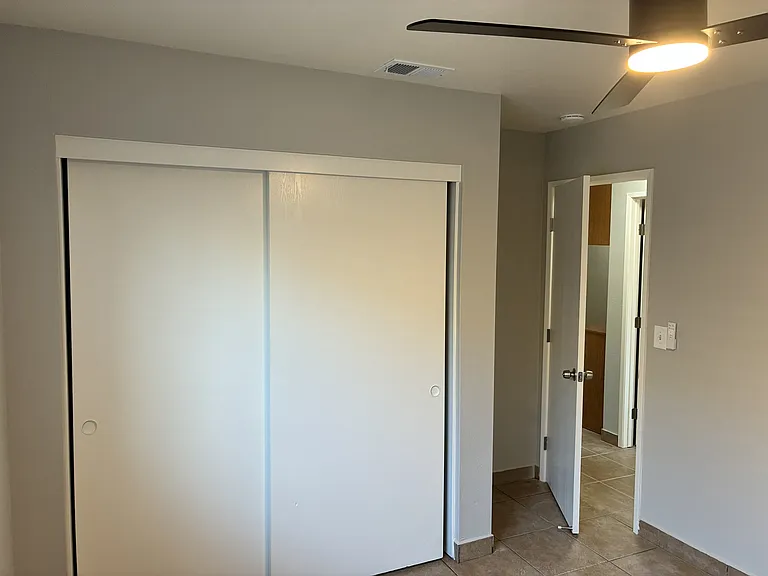 2nd bedroom with brand new ceiling fan with remote