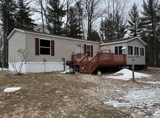 6003 Portage Crk SE, Fife Lake, MI 49633
