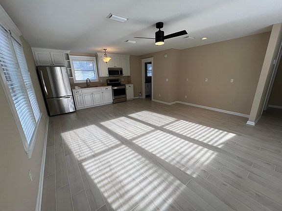 Interior. There's a great cut out space in the far wall that is perfect for an entertainment center and TV.
