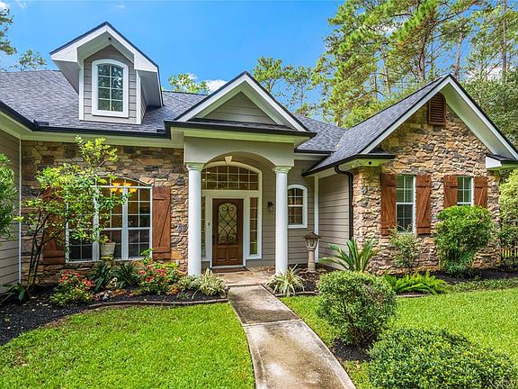 This well maintained home sits on 2.23 wooded acres in the gated community of Indigo Ranch.