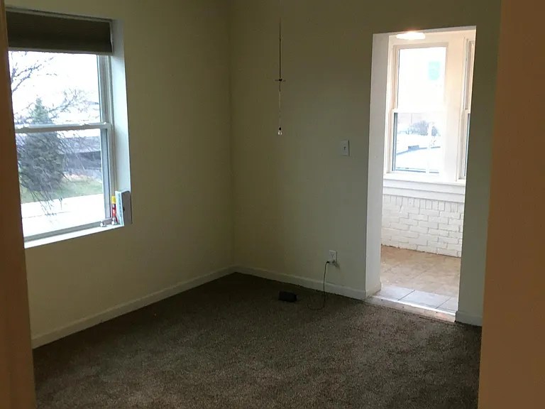 Entering bedroom with sunroom/Office in distance
