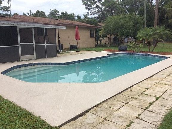 In ground pool; rent includes weekly maintenance