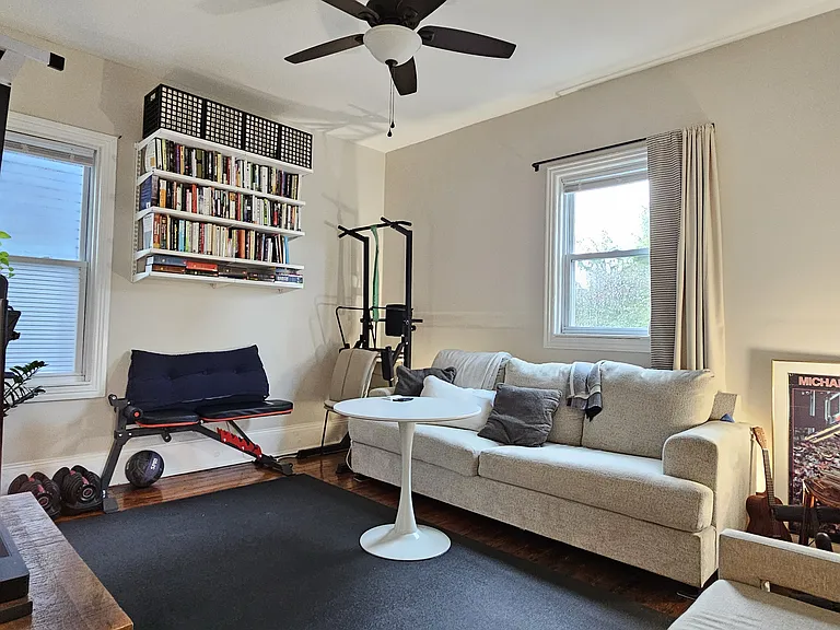 Large and sunny corner bedroom with closet