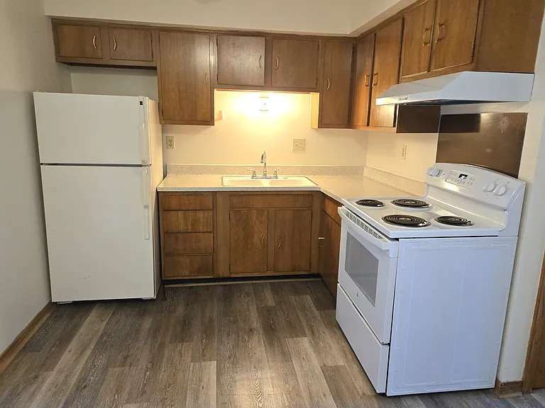 Stove and new refrigerator included.