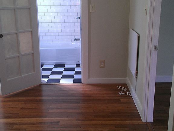 Den looking into bathroom