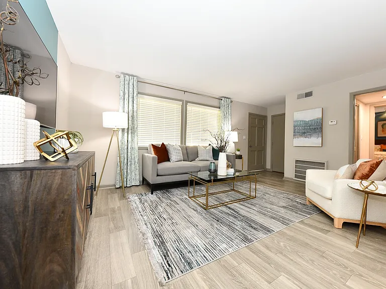 Spacious living room with hardwood-style flooring