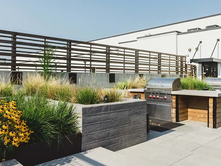 Grill with friends and loved ones on the rooftop deck