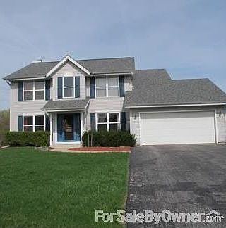 W138 N6525 Manor Hills Blvd.
						:
						Front of House