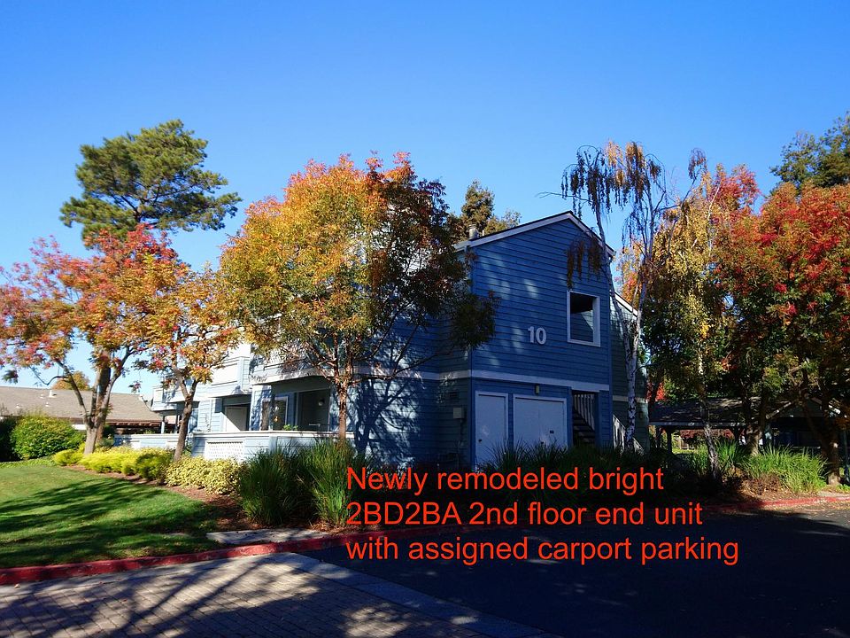 Newly remodeled bright 2BD2BA 2nd floor end unit with assigned carport parking