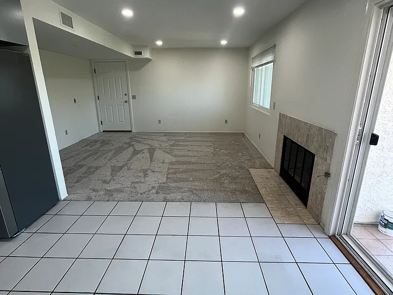Large dining room and living room with views; gas fireplace