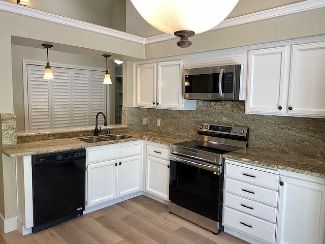 Upstated Kitchen: Granite Counter Tops & Backsplash. Overhead microwave, Dishwasher, Electric Stove and Oven, & Refrigerator.
The Kitchen has room for a table and chairs this room also has a 2nd Balcony to sit and enjoy the outside when wanted.