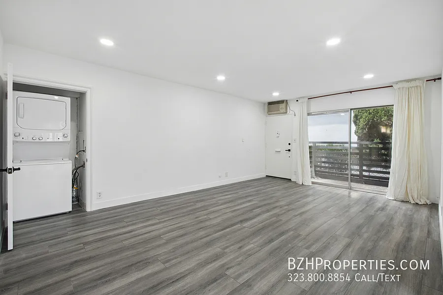 Sun-Filled Renovated 2 Bedroom with In-Unit Laundry — Photo 2