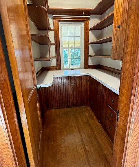 The pantry is loaded with cabinet storage and counter space for your cooking prep.