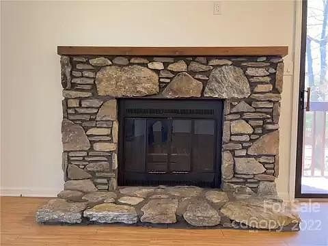 Gorgeous stone fireplace brings warmth and charm
