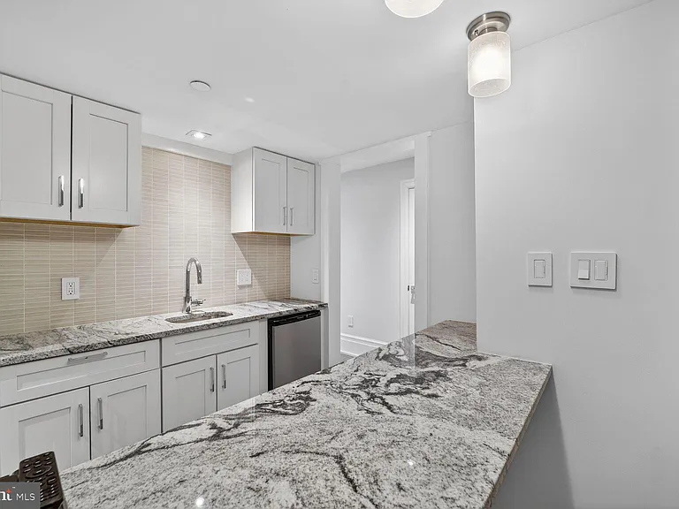4964 Eskridge Ter NW — Photo 46