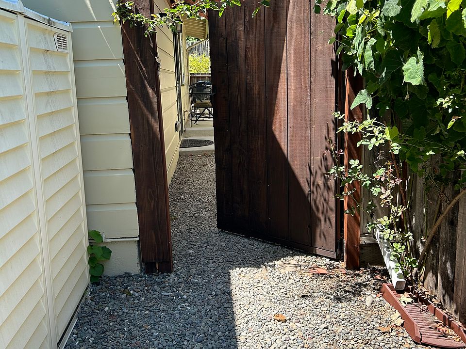 Entrance to the ADU (through the gate). The outdoor storage shed is to the left.