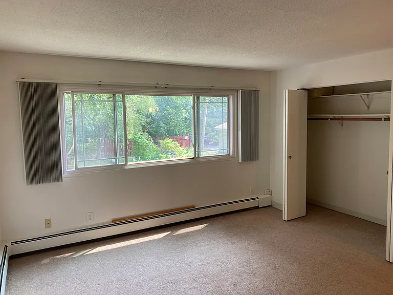 Large windows and closet.
