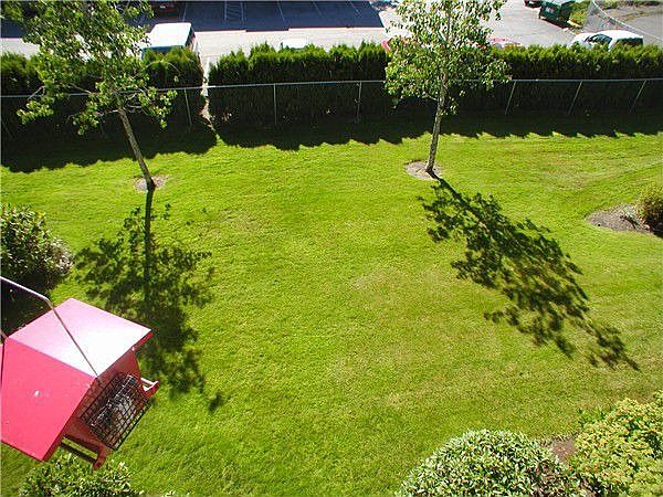 deck looks onto green area