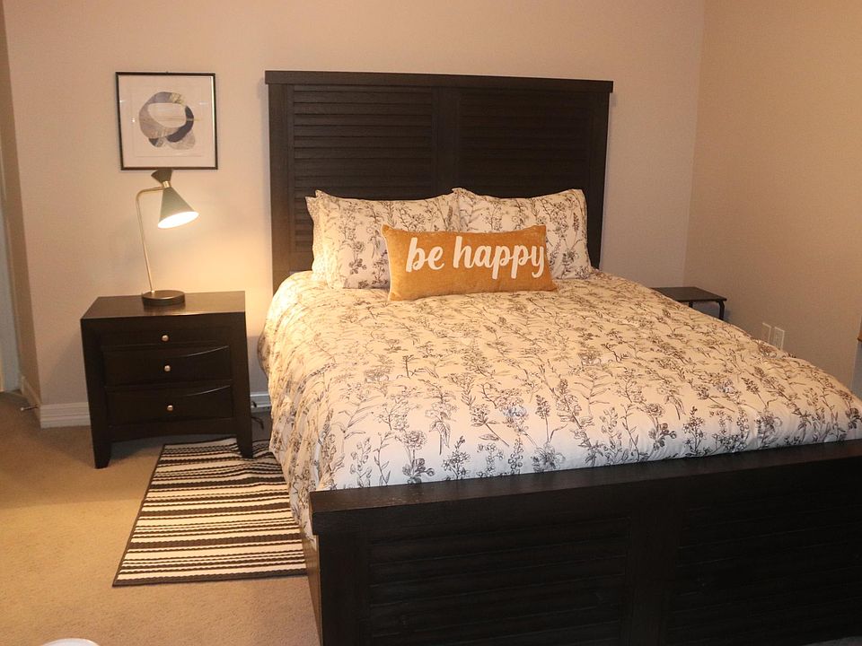 2nd bedroom has night stand, dresser and desk with chair. Closet has extra sheets and blanket and laundry basket.