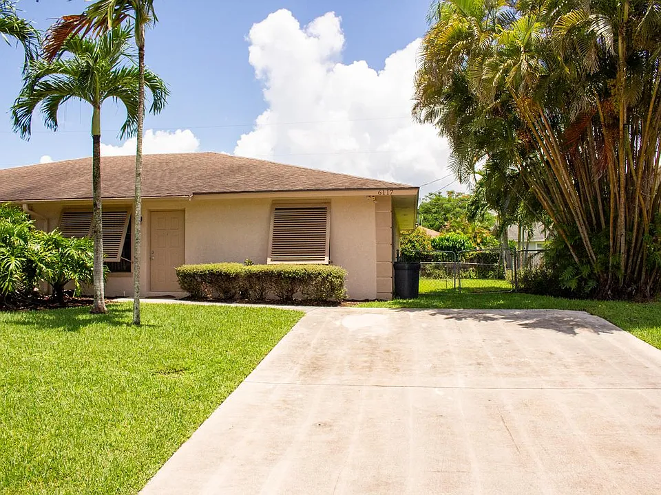 front yard/ 2-car driveway