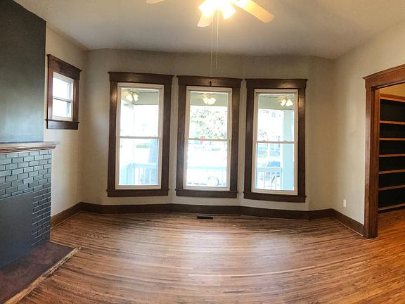 View of bedroom #1 with adjoining bonus room/office/dressing room from the open double pocket doors. (Could also be opened as a living room if you only need 1 bedroom.)