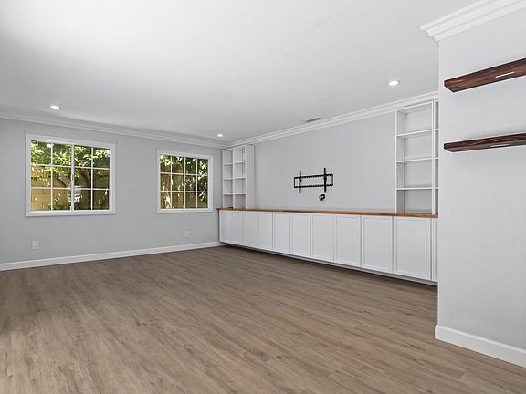 Added Family Room with an abundance of storage and overlooking the backyard