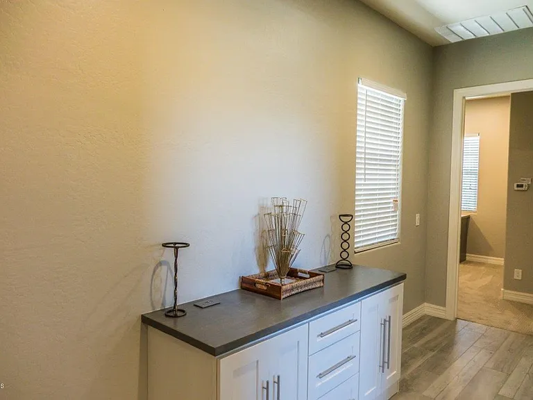 9775 W Rowel Rd — Photo 30
