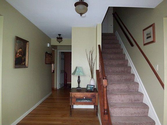 foyer with hardwood floor