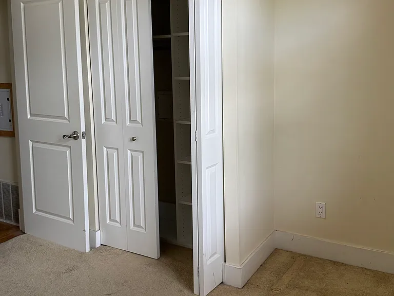 Second bedroom closet view.