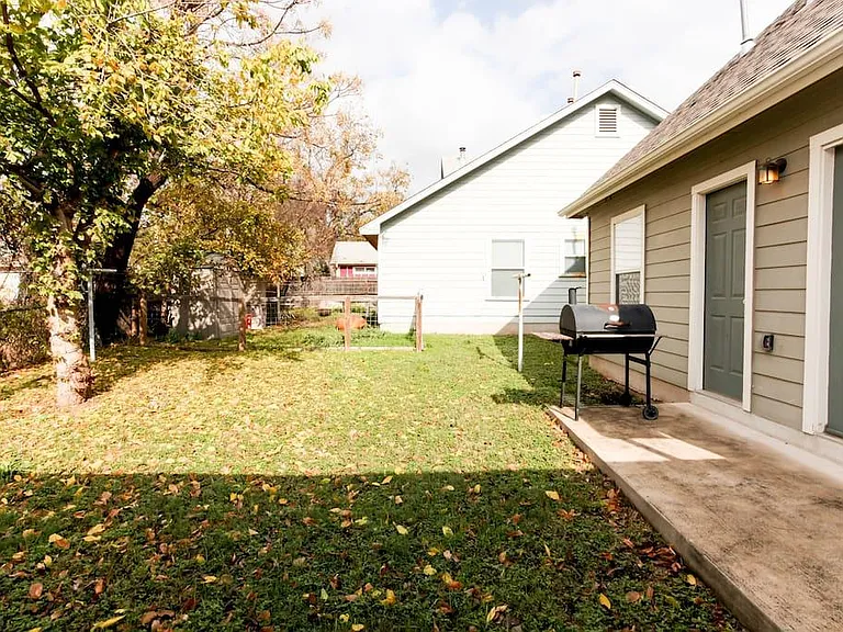 Backyard, BBQ pit is no longer there.
