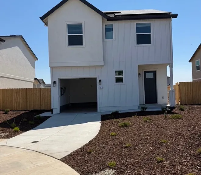 Brand new modern style home with solar panels on a quiet court.