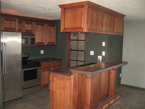 KITCHEN, PANTRY AND BAR