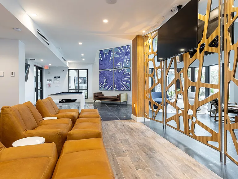Clubroom with game area and comfortable seating