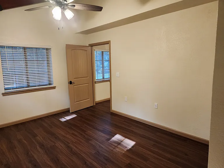 Opposite corner of bedroom now looking at door coming from the living room.