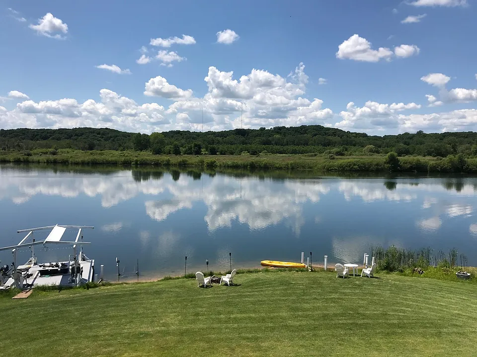 Your own private waterfront seating area, sandy beach entrance, very warm clean swimming and fishing water