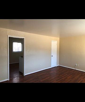 Living room and coat closet.