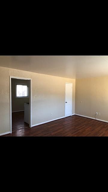 Living room and coat closet.
