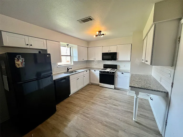 2212 Rifle Bend Dr — Photo 7