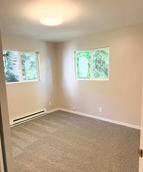 2 large bright bedrooms with new windows and new carpet.