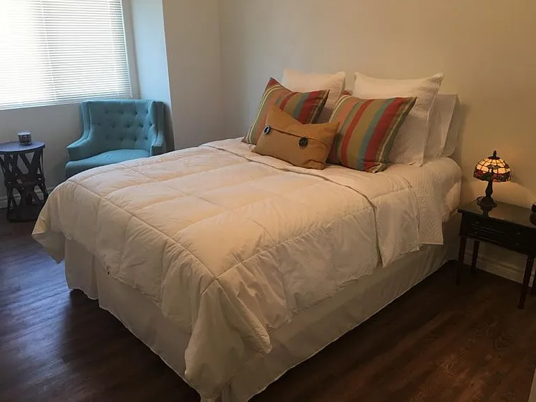 Bedroom, the apartment is unfurnished but the photos have past owner's furniture.