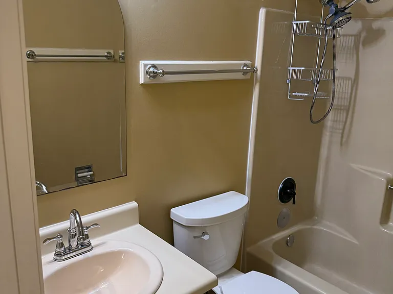 Full tub/shower on second floor w/17" toilet with slow-close lid, and exhaust fan/light combo.