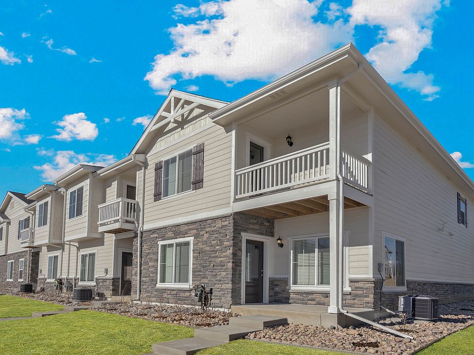 The Monarch is a beautiful two story home with siding and stone.