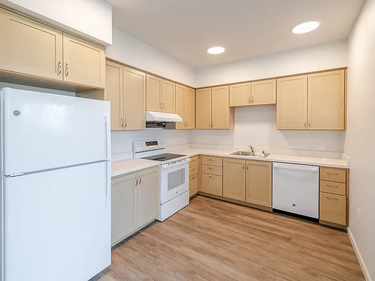Inviting kitchen featuring generous cabinet space.