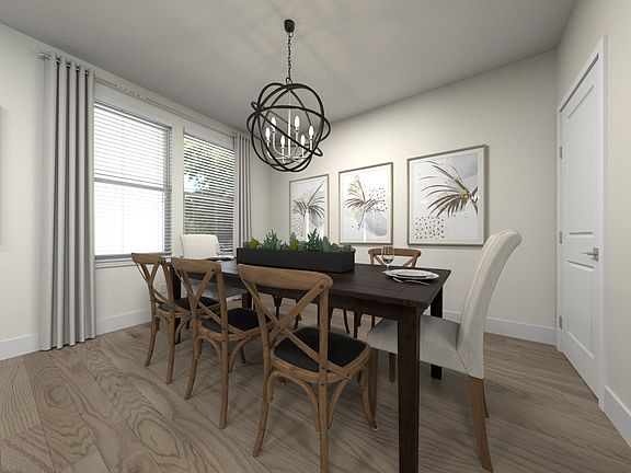 The open-concept floorplan allows for an easy flow between the kitchen and dining areas.