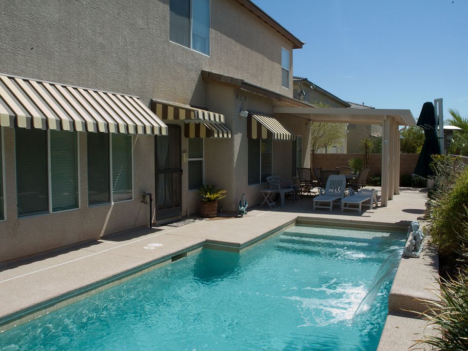 Self cleaning pool and waterfall