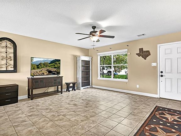 Inviting neutral tones with tile flooring in this 2,268 sqft home with energy efficient appliances.