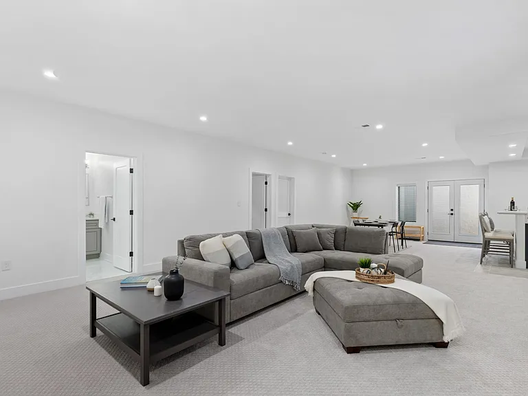 Sectional sofas, ottoman, and coffee table