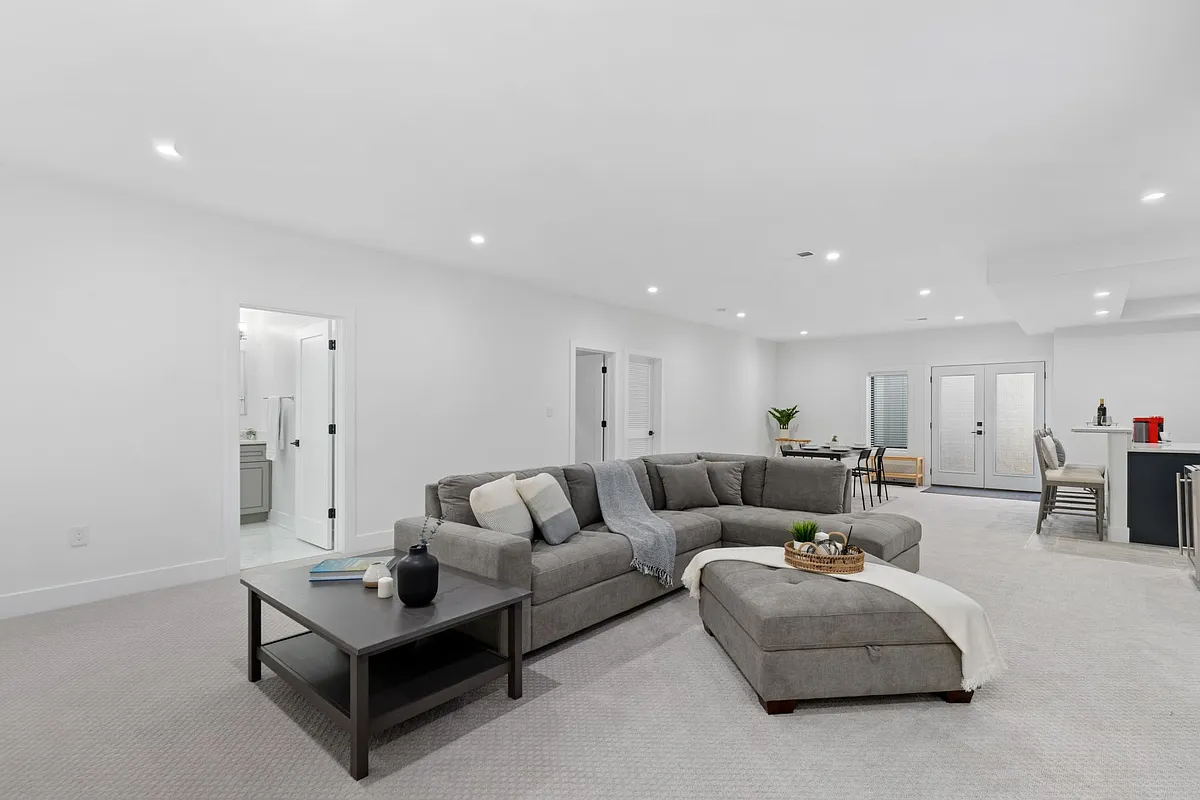 Sectional sofas, ottoman, and coffee table - 416 Blair Rd NW